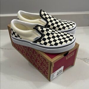 Vans Black and White Checkerboard Slip-On Sneakers